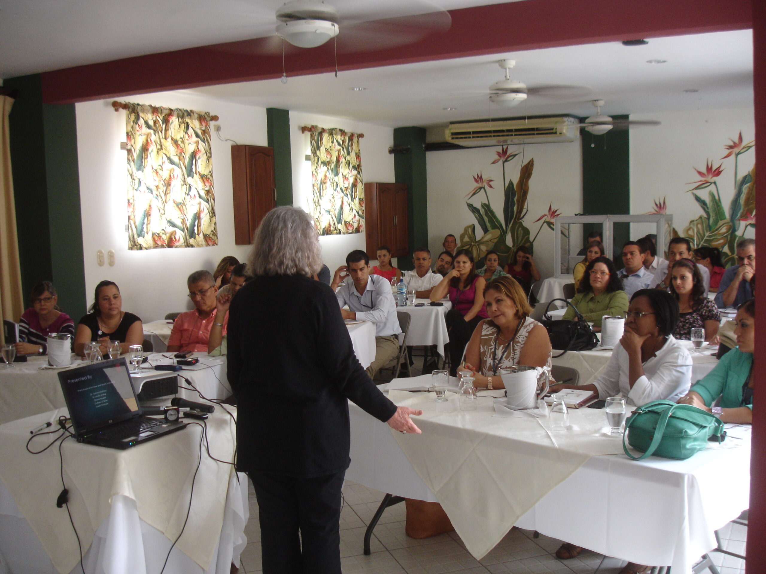 Photo of Individuals Sitting Together For a Presentation